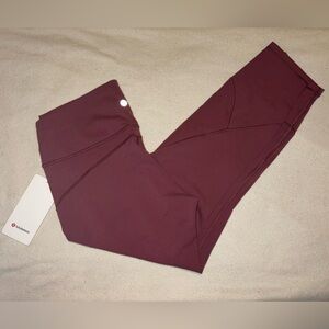 lululemon size 12 Plum colored In Movement Tight 25” work out leggings